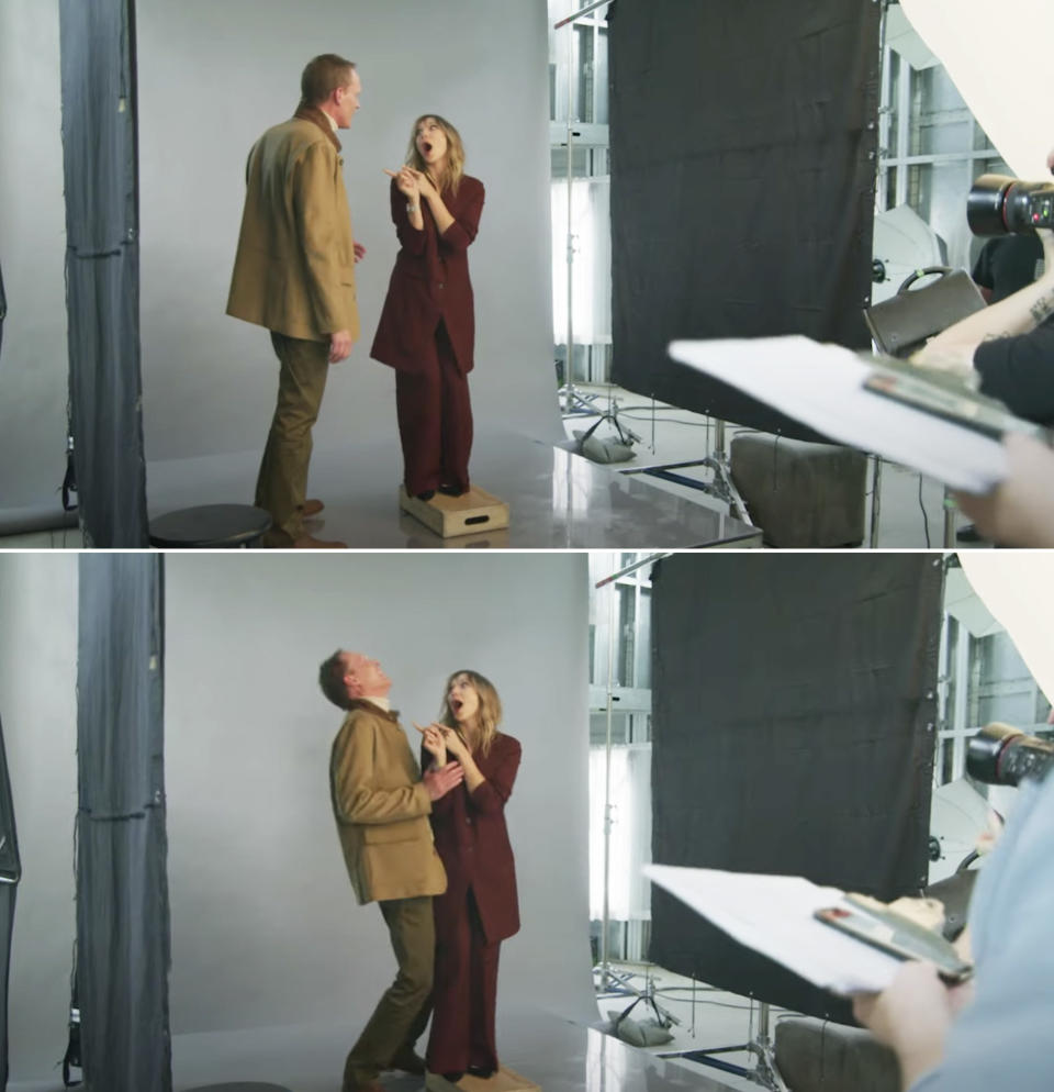 Lizzie pointing at Paul and making him laugh