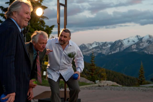 <p>Perry Johnson</p> Jacques Pépin, Jean-Claude Szurdak, and Cesare Casella play bocce on Aspen Mountain