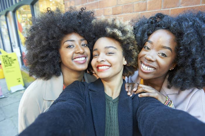 Three women taking a selfie