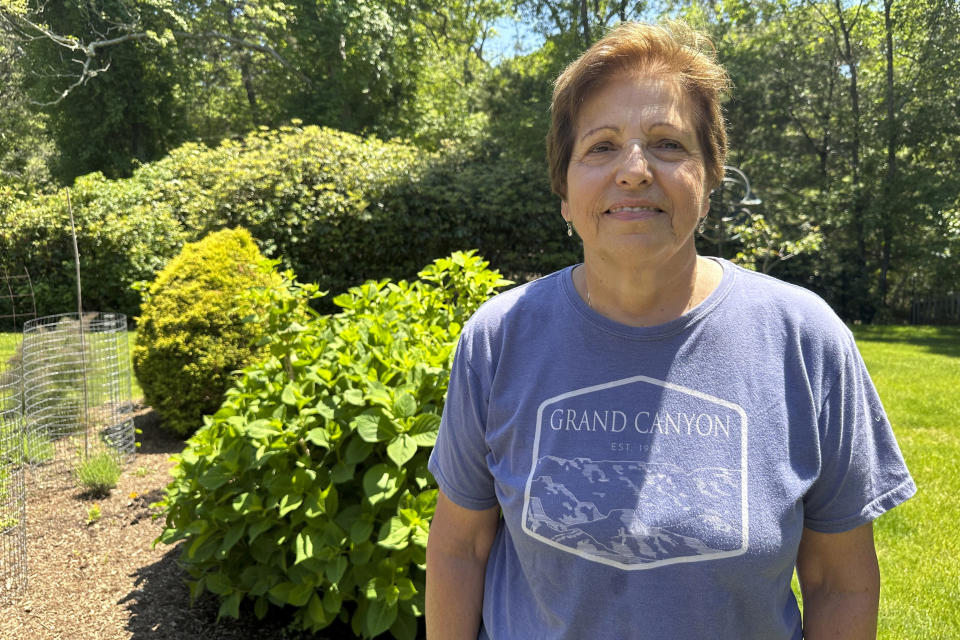 Sally Rizzo, a medical marijuana user, poses for a photo on June 3, 2024, in Vineyard Haven, Mass. Unless something changes, Martha's Vineyard is about to run out of pot, affecting more than 230 registered medical users and thousands more recreational ones. (AP Photo/Nick Perry)