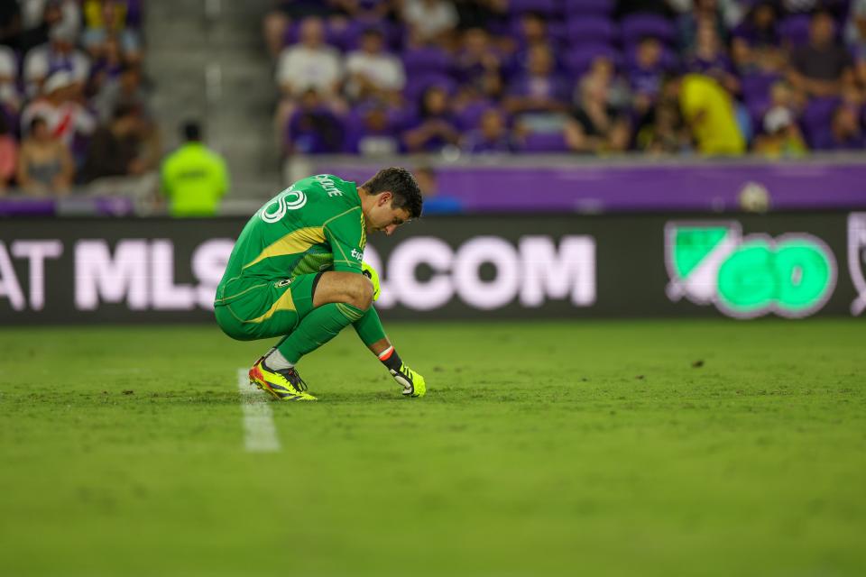 Crew goalkeeper Patrick Schulte gets ready for the second half against Orlando City.