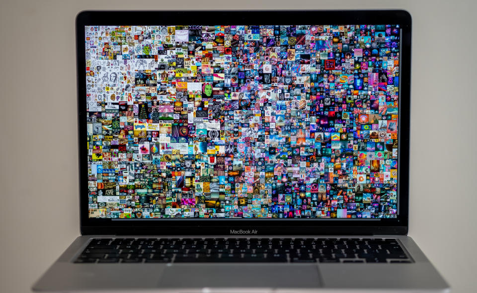 Macbook Air with Beeple’s pattern “Everydays: The First 5,000 Days.” - Credit: Shutterstock/Courtesy of DMA United