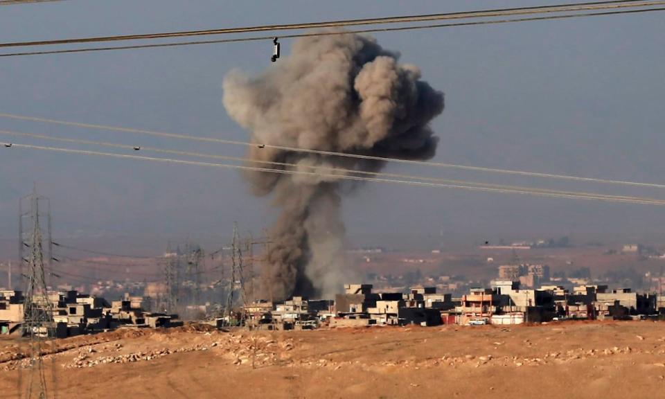 Smoke rises after an airstrike by U.S.-led coalition warplanes during fighting between Iraqi special forces and Islamic State militants on the western side of Mosul on Feb. 25.  