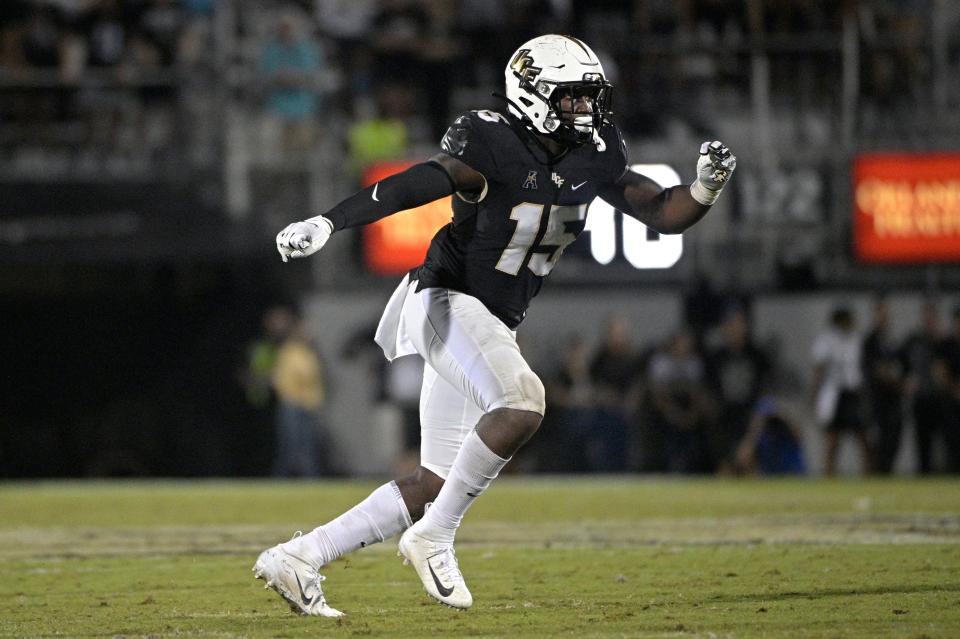 Central Florida linebacker Tatum Bethune (15) follows a play during the second half of an NCAA college football game against Boise State on Thursday, Sept. 2, 2021, in Orlando, Fla. (AP Photo/Phelan M. Ebenhack)