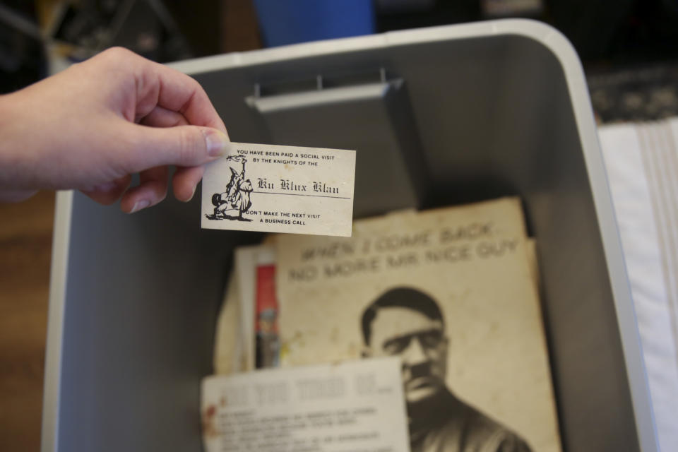 Some of the racist material collected over decades by former Ku Klux Klan leader John Howard is seen on Dec. 9, 2020, in Columbia, S. C.. Howard also ran The Redneck Store in Laurens, South Carolina, for decades. The Echo Group is renovating the shop into a community center and racial reconciliation museum. (AP Photo/Jeffrey Collins)