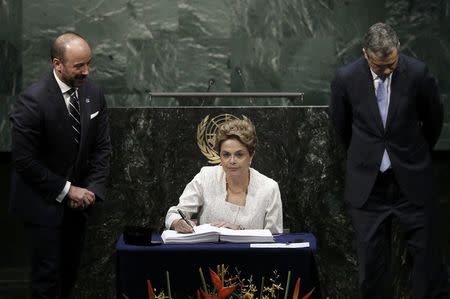 Brazilian President Dilma Rousseff signs the Paris Agreement on climate change at United Nations Headquarters in Manhattan, New York, U.S., April 22, 2016. REUTERS/Mike Segar