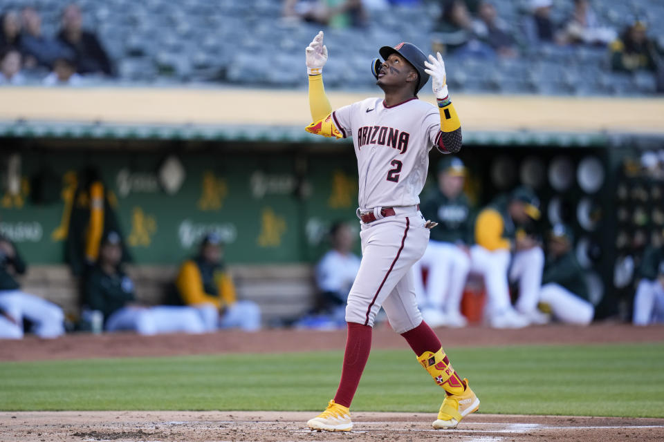 Arizona Diamondbacks' Geraldo Perdomo celebrates after hitting a two-run home run against the Oakland Athletics during the second inning of a baseball game in Oakland, Calif., Monday, May 15, 2023. (AP Photo/Godofredo A. Vásquez)