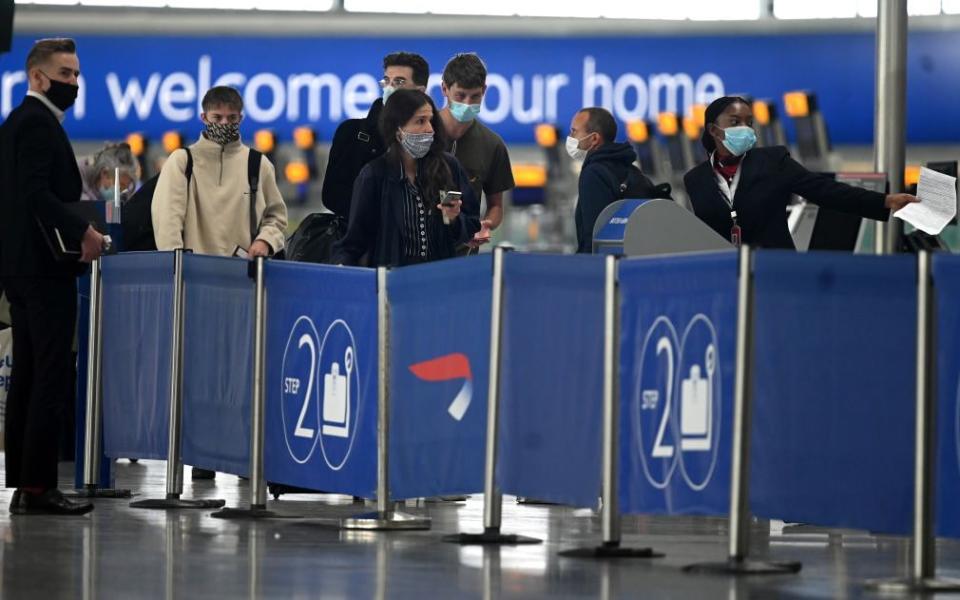 Some countries on the UK's quarantine-free list require passengers to present evidence of a negative test on arrival - Getty