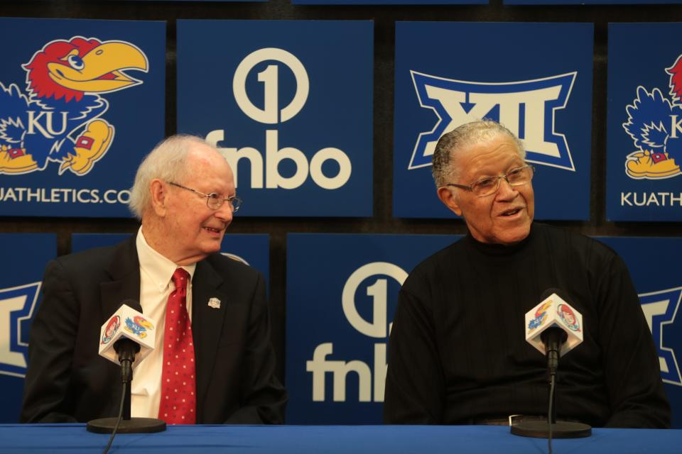 Former Kansas basketball coach Ted Owens, left, and player Walt Wesley, right, take questions during a press conference before Saturday's game against Iowa State inside Allen Fieldhouse.