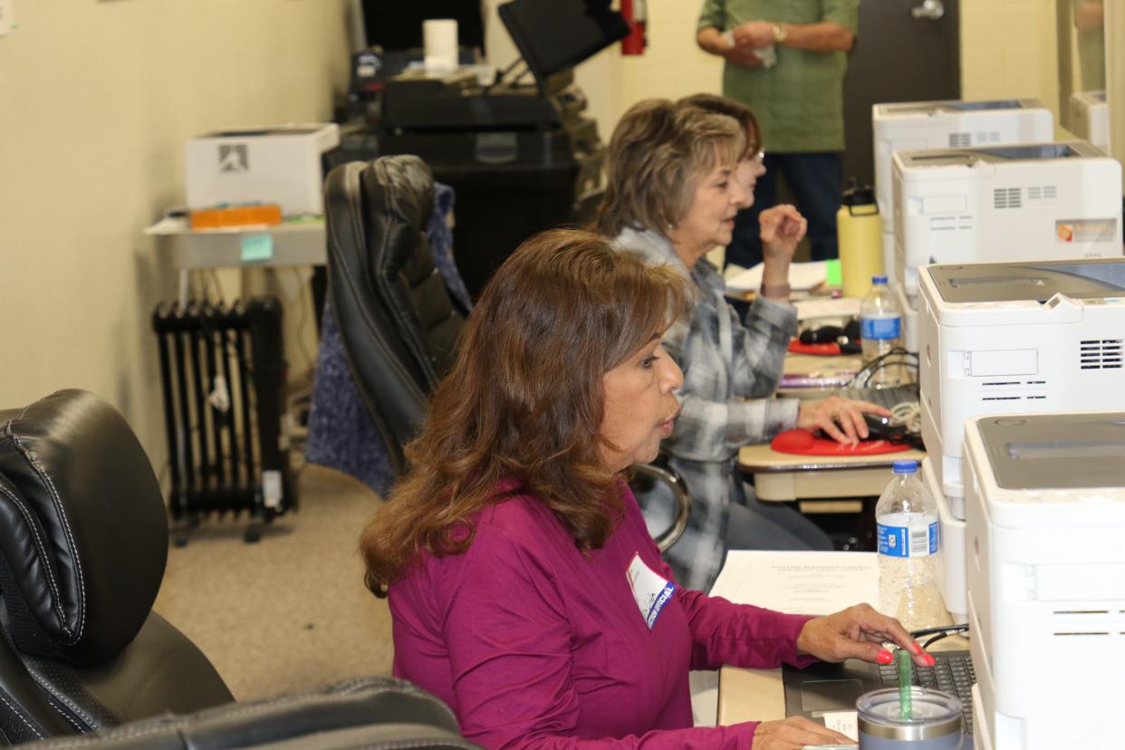 Poll workers take care of last minute voters during the 2023 local elections at the Eddy County Election Warehouse on Nov. 7, 2023.