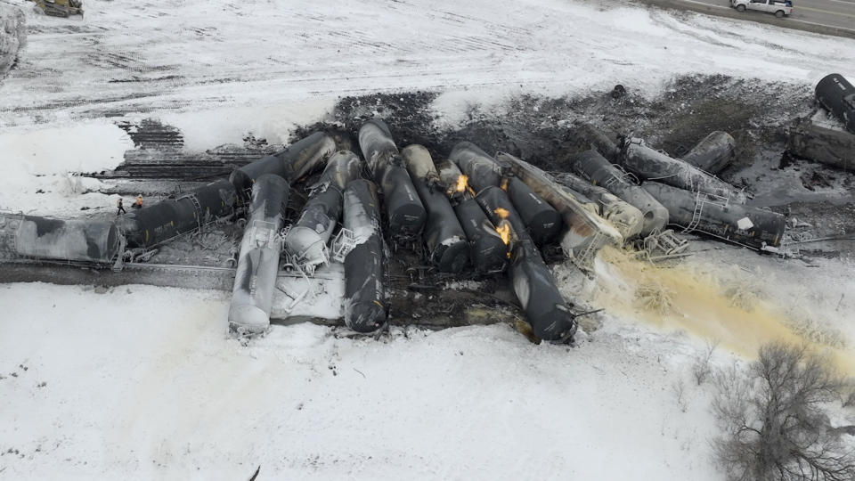 A BNSF train carrying ethanol and corn syrup derailed and caught fire in Raymond, Minn., Thursday, March 30, 2023. BNSF officials said 22 cars derailed, including about 10 carrying ethanol, and the track remains blocked, but that no injuries were reported due to the accident. The cause of the derailment hasn't been determined. (Mark Vancleave /Star Tribune via AP)