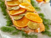 <p>Though easy to make and only requiring five ingredients, this elegant roasted salmon is a supremely impressive main dish—especially for the holidays, when citrus season is in full swing. Topping the salmon with orange and lime rounds not only infuses the oily fish with flavor, but it makes for a beautiful display. <a href="https://www.myrecipes.com/recipe/citrus-roasted-salmon-0" rel="nofollow noopener" target="_blank" data-ylk="slk:View Recipe" class="link rapid-noclick-resp">View Recipe</a></p>