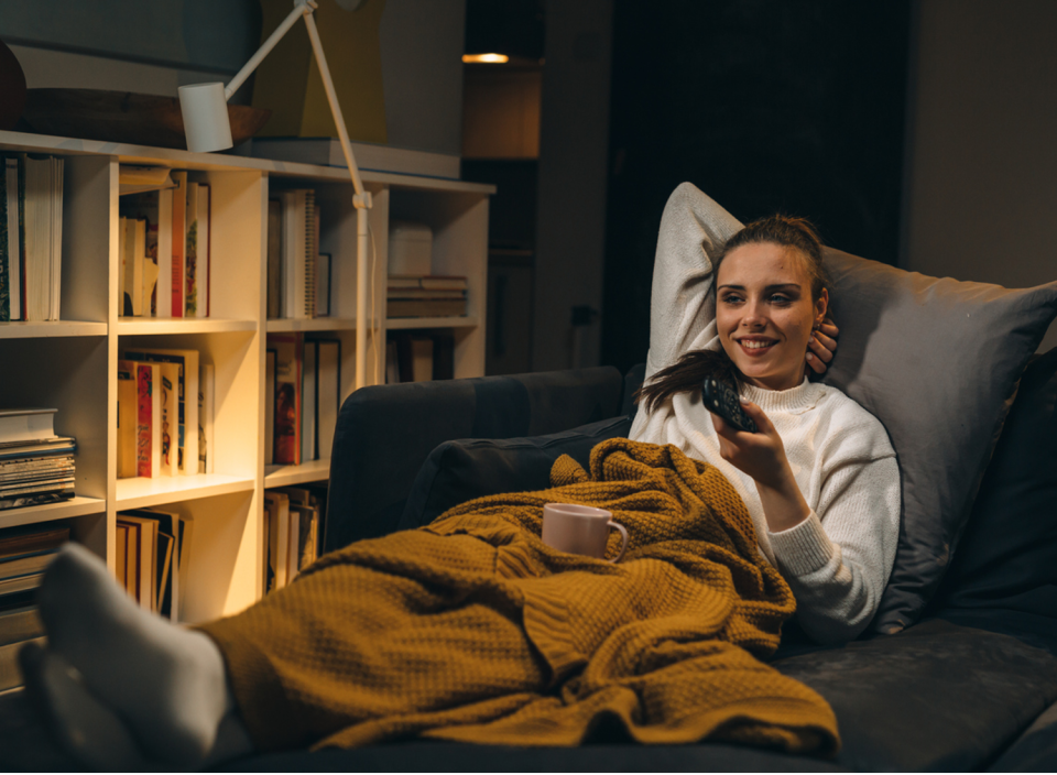 Balancing your drink in your lap all the time? Try this handy cup holder. (Source: iStock)