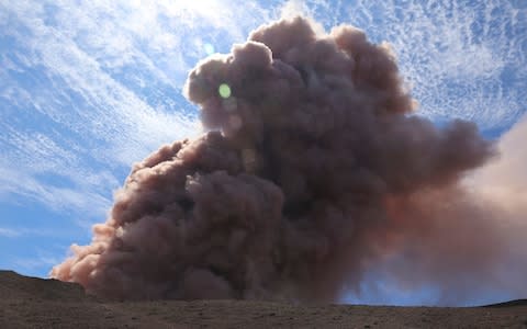 a plume of ash rises from the Puu Oo vent on Hawaii's Kilaueaa Volcano  - Credit: US Geolgogical Survey/AP