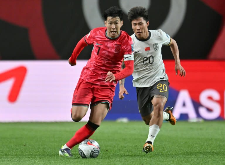 South Korean skipper <a class="link " href="https://sports.yahoo.com/soccer/players/3862671/" data-i13n="sec:content-canvas;subsec:anchor_text;elm:context_link" data-ylk="slk:Son Heung-min;sec:content-canvas;subsec:anchor_text;elm:context_link;itc:0">Son Heung-min</a> gets away from <a class="link " href="https://sports.yahoo.com/soccer/teams/china-women/" data-i13n="sec:content-canvas;subsec:anchor_text;elm:context_link" data-ylk="slk:China;sec:content-canvas;subsec:anchor_text;elm:context_link;itc:0">China</a>'s Xie Wenneng (Jung Yeon-je)