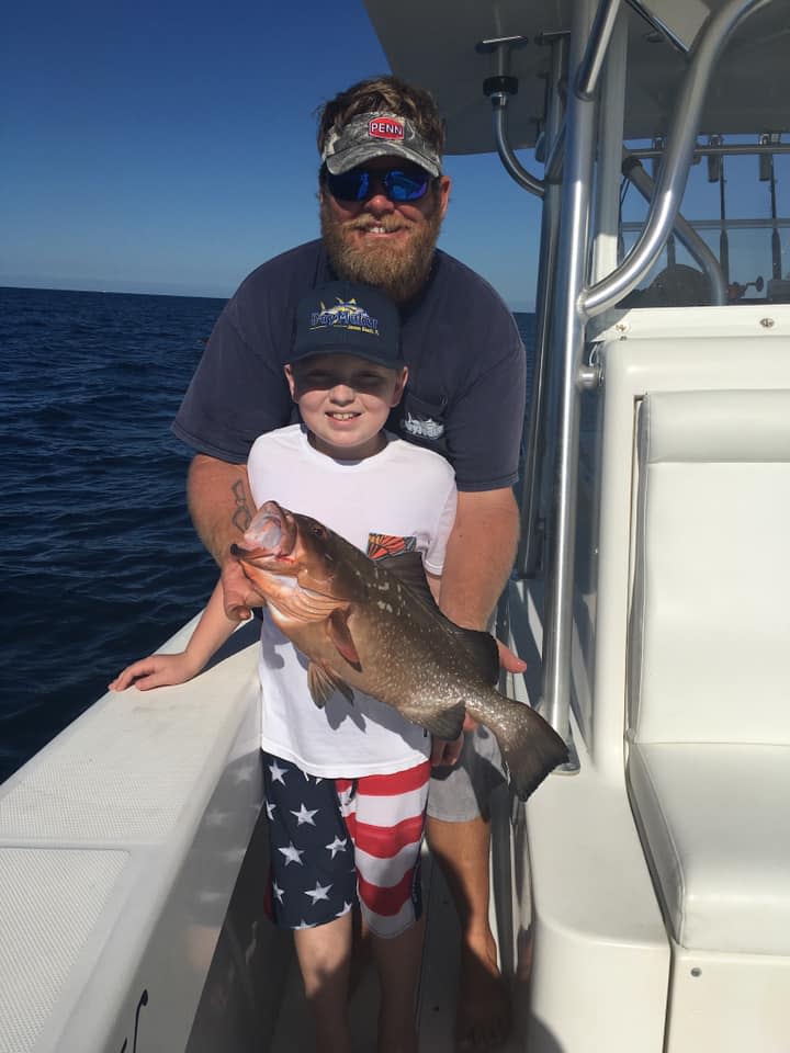 Capt. Patrick Price and son Zane of Jensen Beach fish aboard DayMaker charters out of Sailfish Marina in Stuart.
