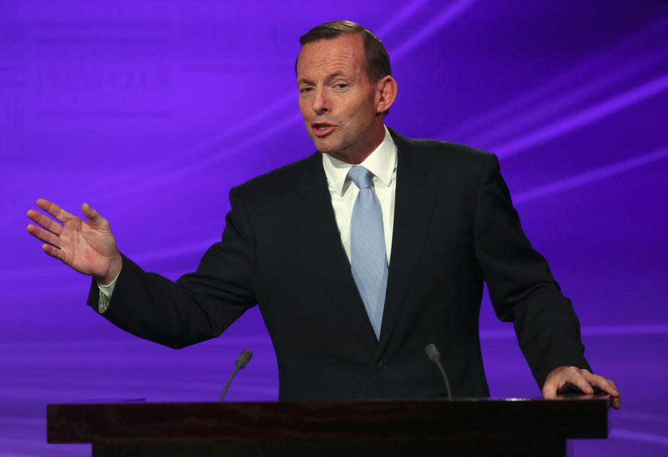 Leader of the conservative opposition Tony Abbott speaks during a debate with the Australian Prime Minister and leader of the Australian Labor Party Kevin Rudd at the National Press Club in Canberra August 11, 2013. Australia will hold a federal election on September 7.  REUTERS/Andrew Meares/Pool    (AUSTRALIA - Tags: POLITICS ELECTIONS)