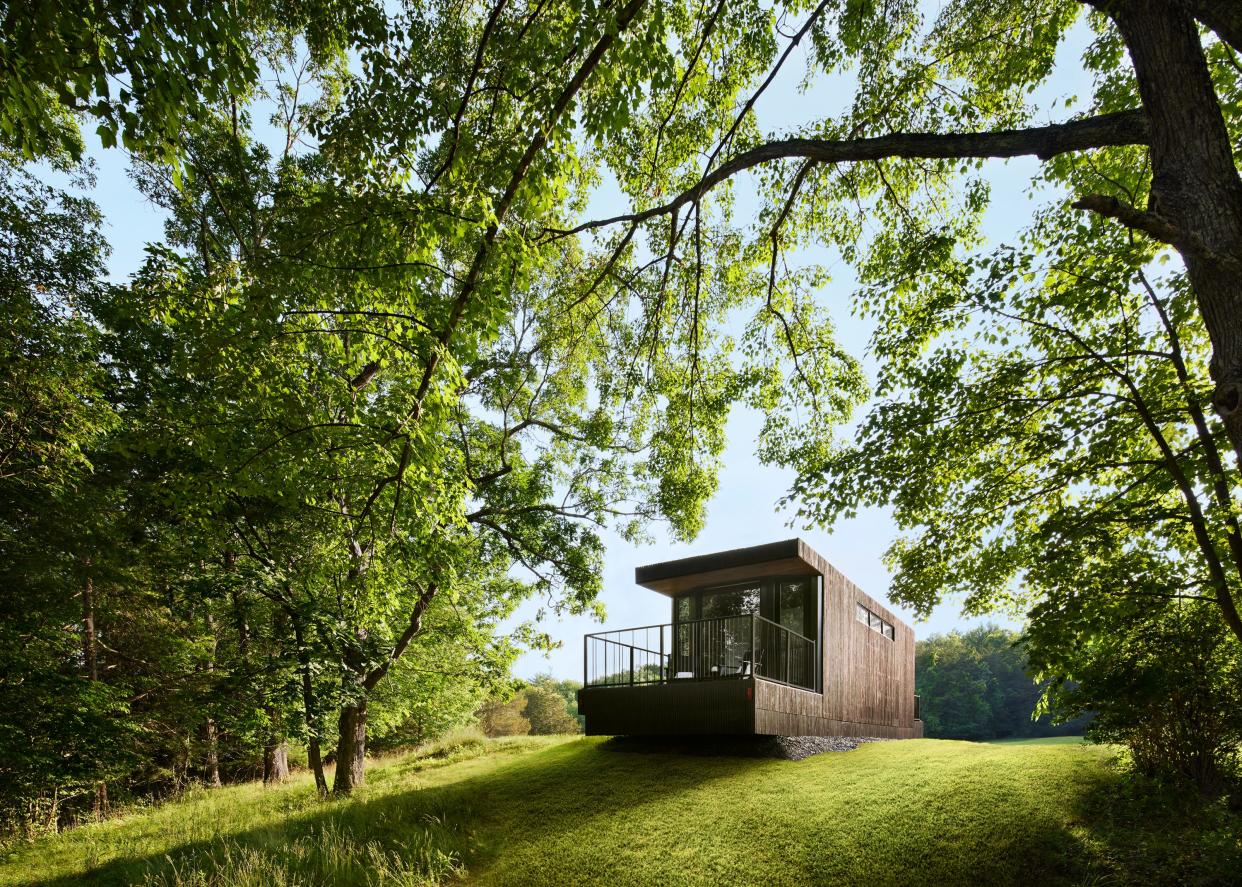 A Moliving unit sits atop a hill.