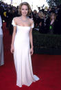 A blonde Angelina Jolie attended the 5th Annual Screen Actors Guild Awards in 1999 wearing a plunging white dress.