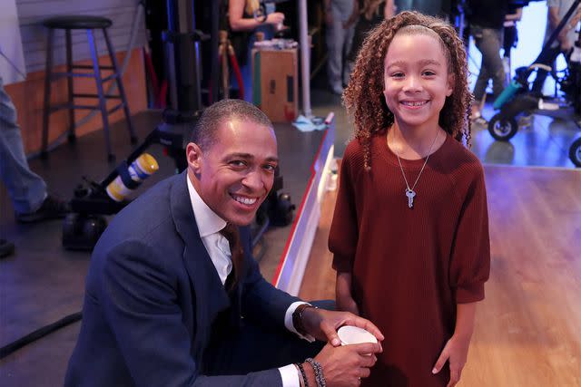 <p>Lou Rocco/ABC via Getty </p> T.J. Holmes and daughter Sabine on the set of "Good Morning America"