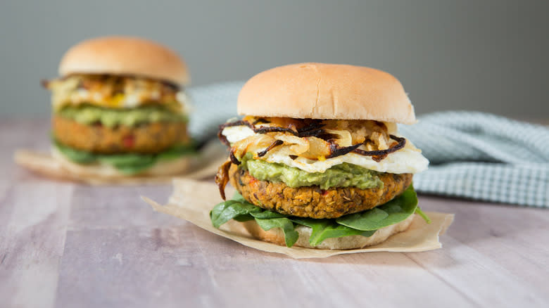 avocado veggie burgers on table