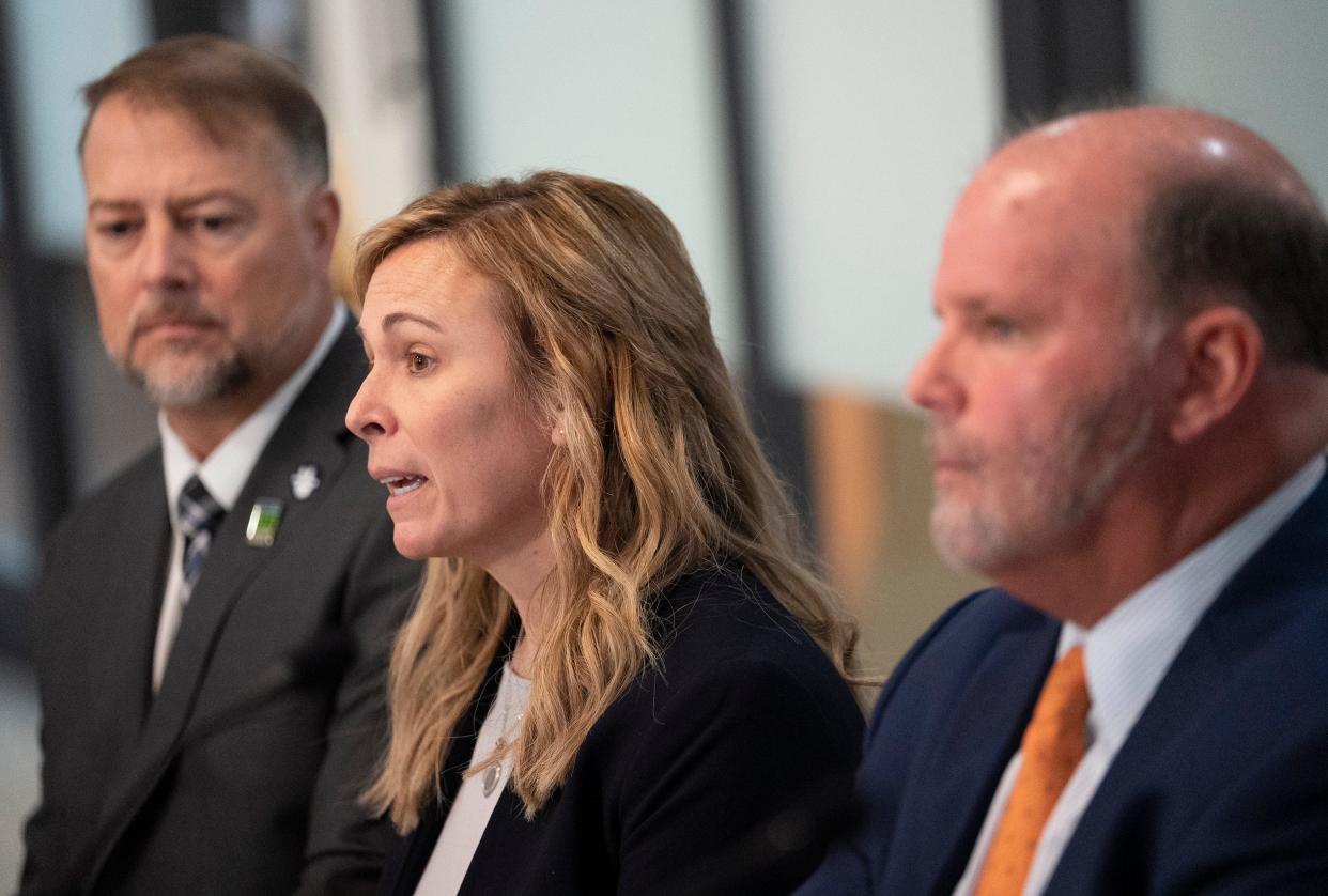 Jan 23, 2023; Columbus, OH, USA;  Attorney Rex Elliott (R), Shari and Cory Foltz answer questions during a press conference at the Cooper Elliott Law Offices. The Foltz family has received a $2.9 million dollar settlement from Bowling Green University following a lawsuit concerning their son's death in a hazing incident that occurred at the Pi Kappa Alpha fraternity.  Mandatory Credit: Brooke LaValley/Columbus Dispatch