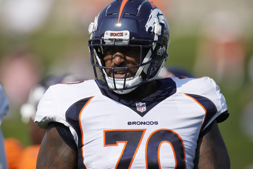 Denver Broncos offensive tackle Bobby Massie takes part in drills during an NFL football training camp at the team's headquarters Wednesday, Aug. 18, 2021, in Englewood, Colo. (AP Photo/David Zalubowski)