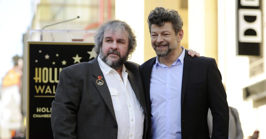 Peter Jackson, left, director, co-writer and producer of the film trilogies "The Lord of the Rings and "The Hobbit," poses with actor Andy Serkis during a ceremony honoring Jackson with a star on the Hollywood Walk of Fame in Los Angeles on Dec. 8, 2014. (Photo by Chris Pizzello/Invision/AP, File)