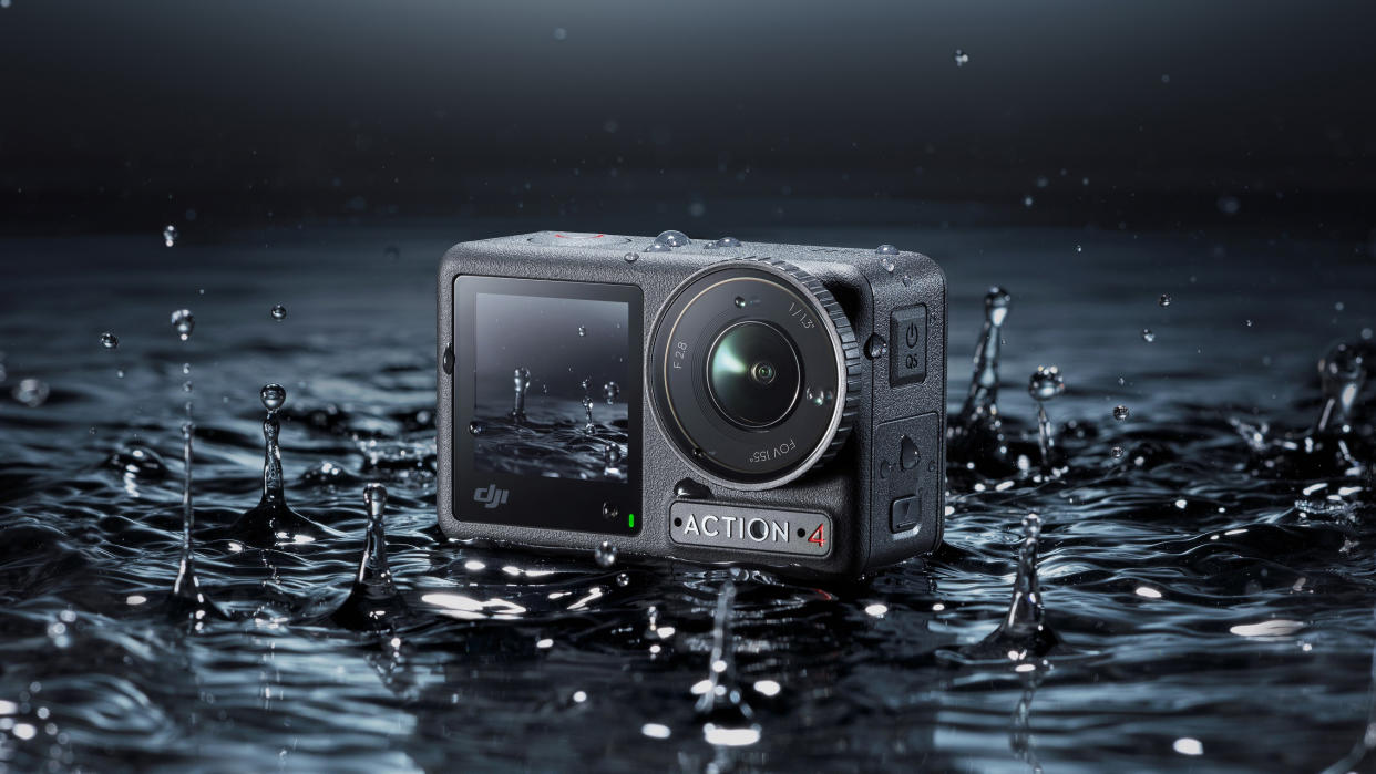  DJI Osmo Action 4 camera in shallow water surrounded by splashes 