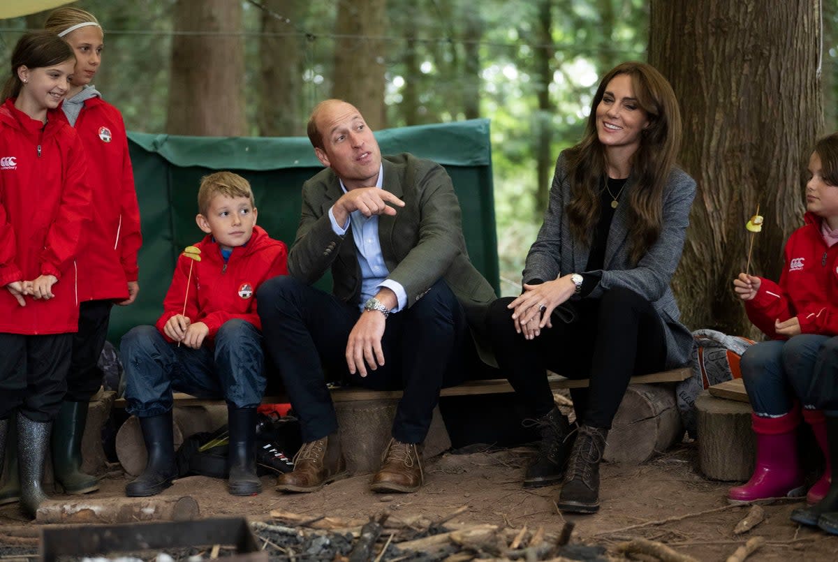 The Prince and Princess of Wales during a visit to Madley Primary School in Hereford to look at their forest school (PA)