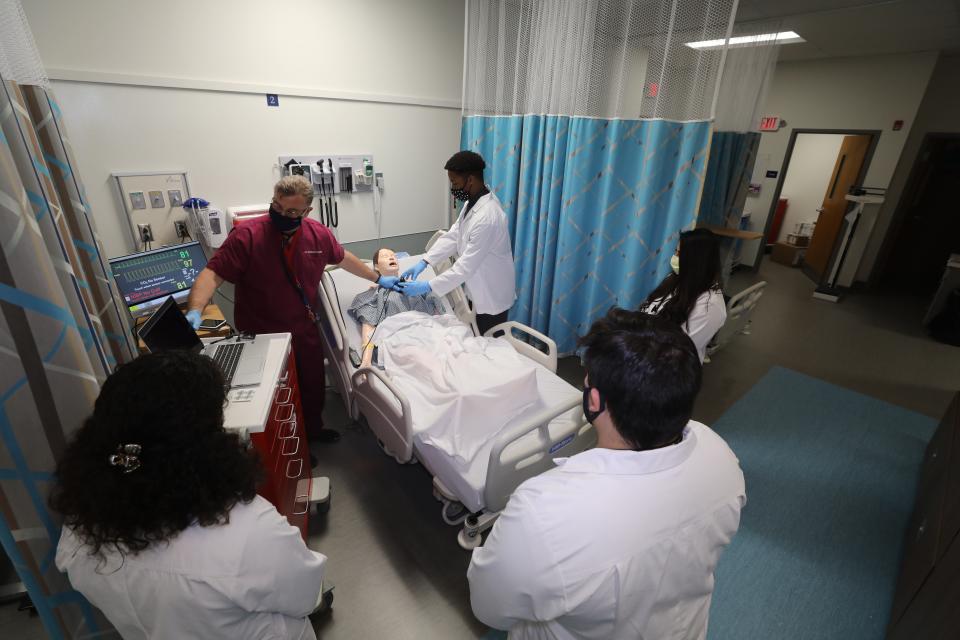 Students learn how to perform a diagnostic ultrasound simulation on a patient manikin at Saint Elizabeth University in Morristown.