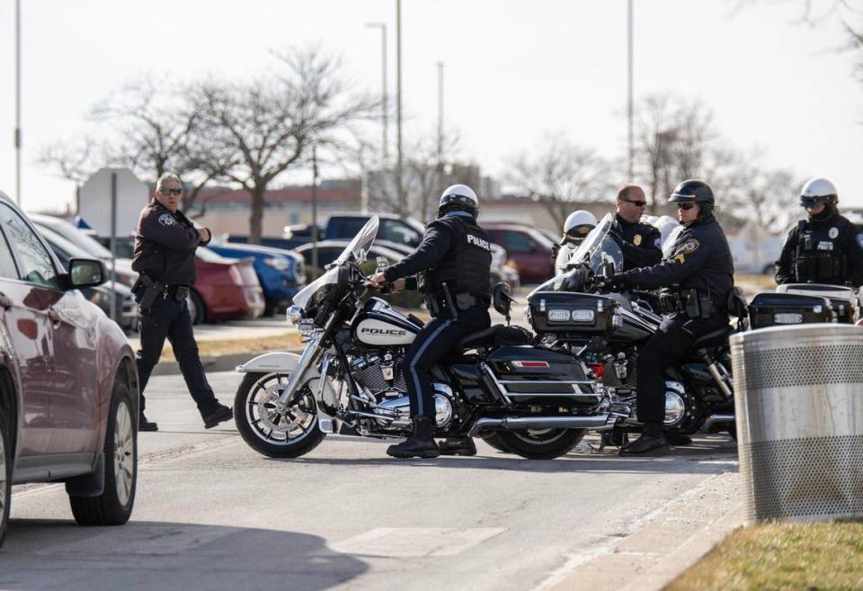 Two Independence police officers were shot, one fatally, Thursday, Feb. 29, 2024, in the northeast part of the city, a police spokesman said. After word of the shooting, police gathered outside of Centerpointe Medical Center in Independence.
