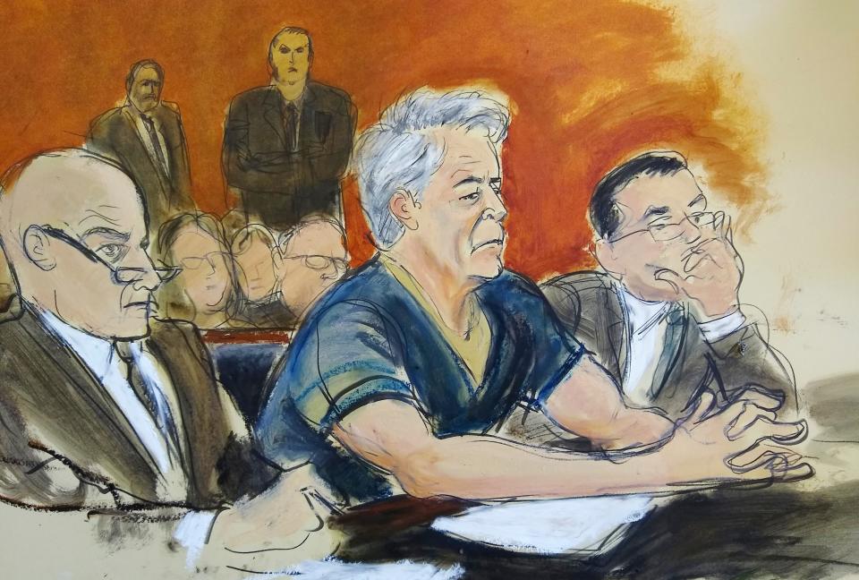 In this courtroom artist's sketch, Jeffrey Epstein, center, sits with attorneys Martin Weinberg, left, and Marc Fernich during his July arraignment in New York federal court on federal sex trafficking charges.