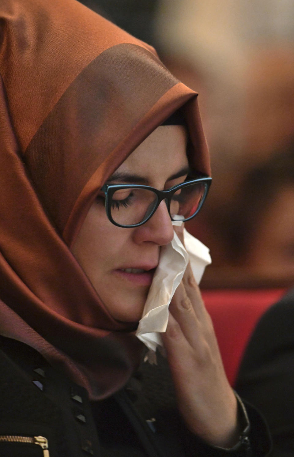 Hatice Cengiz, the fiancee of the killed Saudi journalist Jamal Khashoggi, reacts during a memorial event for her fiancee at the Mechanical Engineers Institute in London, Monday Oct. 29, 2018. The Al Sharq Forum think tank and Middle East Monitor have organised the event in honour of the murdered journalist Khashoggi who died in the Saudi consulate in Turkey. (John Stillwell/PA via AP)