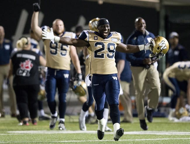 The Blue Bombers celebrate after defeating the Tiger-Cats in Week 6. (The Canadian Press)