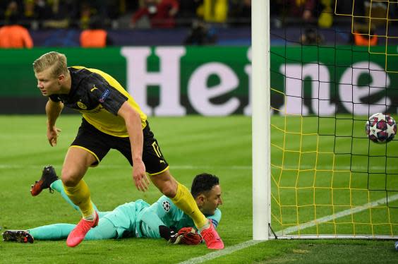 Haaland wheels away in delight after putting Dortmund ahead (AFP via Getty Images)