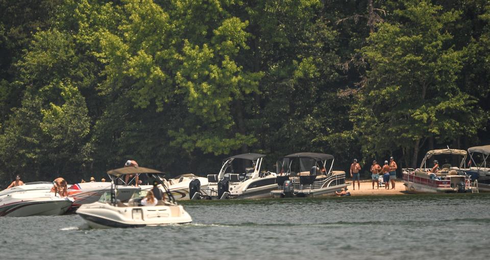 Boats arrive at Apple "Party" Island on Lake Hartwell, after a Meals On Wheels fun run to Clemson Marina from Green Pond Landing in Anderson County, June 2023.