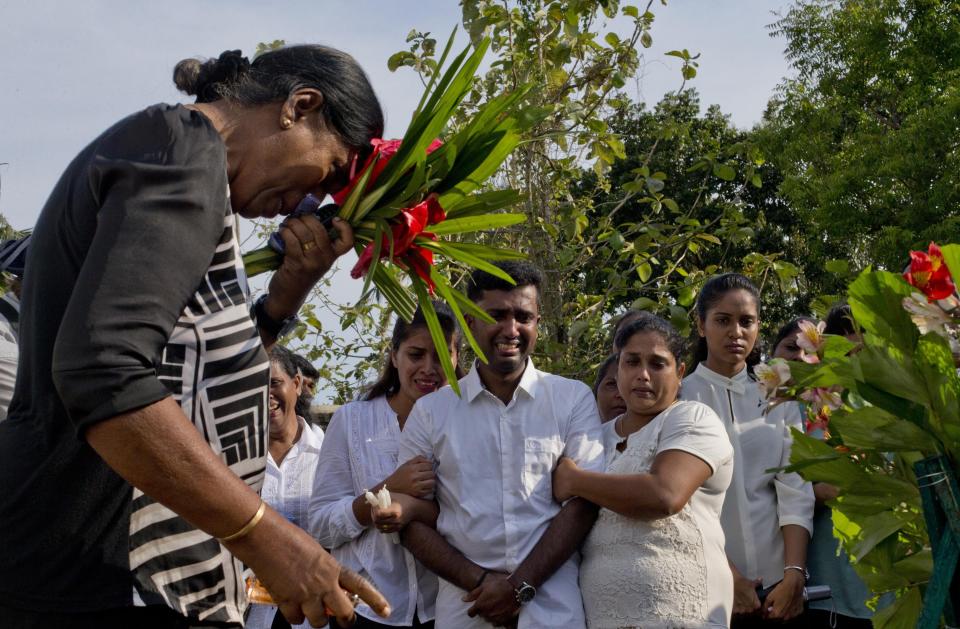 Nilanga Anthony, center, mourns the death of her seven-year-old nephew Dhulodh Anthony, on April 23, 2019 in Negombo, Sri Lanka. (Gemunu Amarasinghe / ASSOCIATED PRESS)