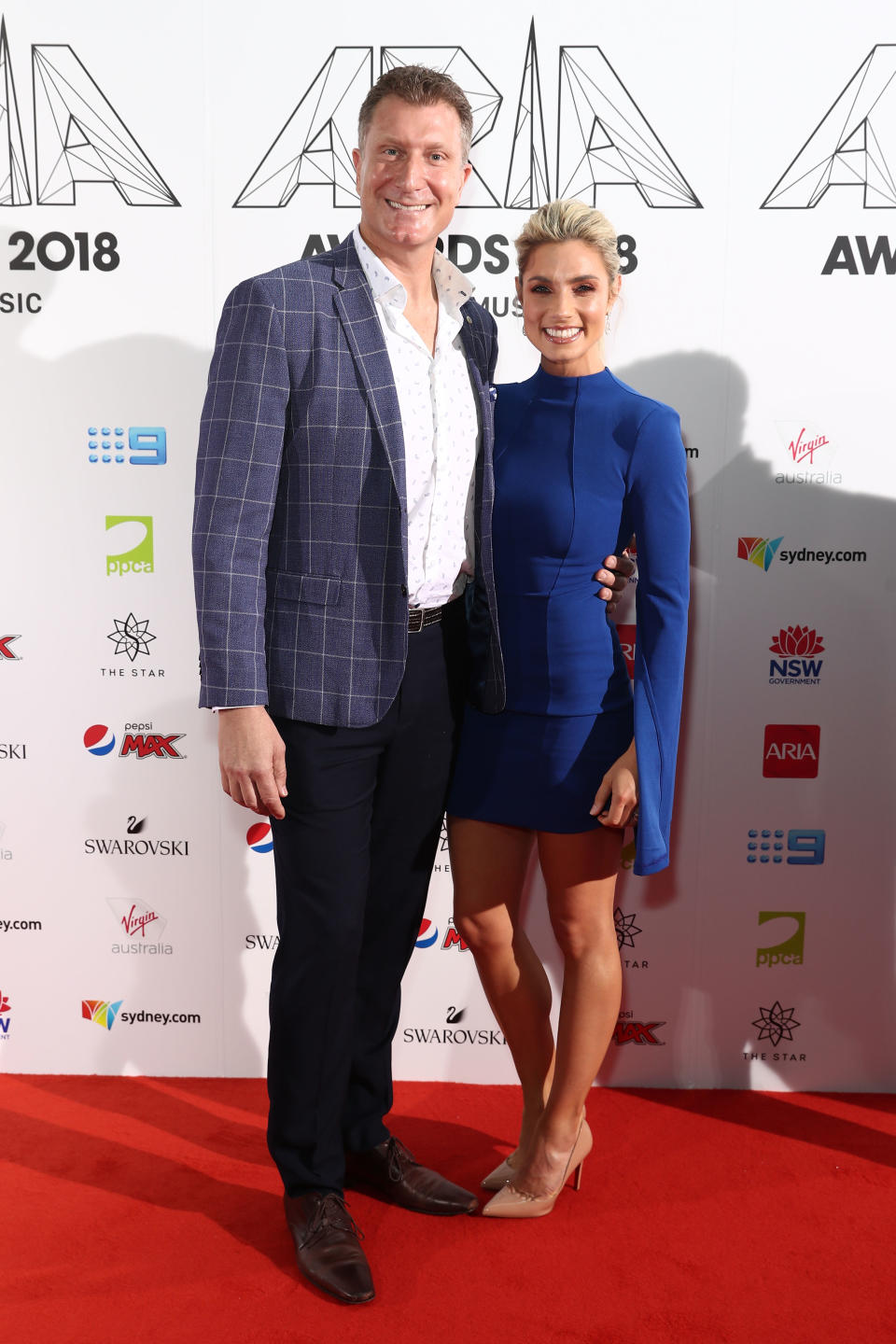 Simon Pryce (the red Wiggle) and Lauren Hannaford