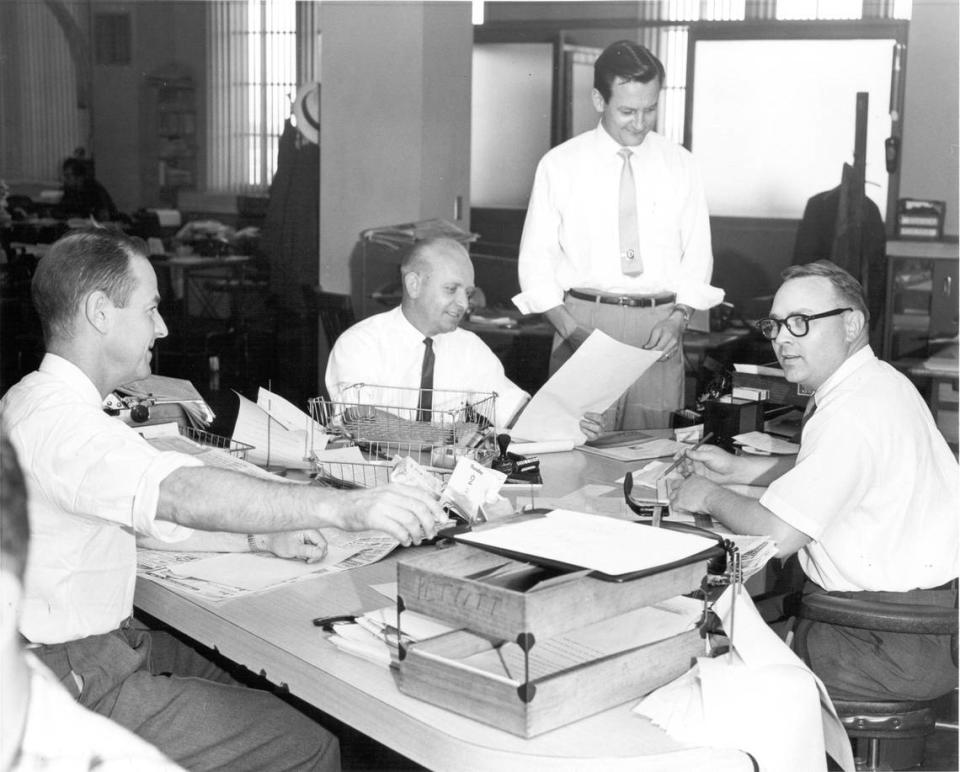 The Fresno Bee city desk, photographed in July 1959. Pictured from left to right are James McClatchy, George Grunner, Don Slinkard (standing) and Charles Hurley. Slinkard, who retired as The Bee’s managing editor in 1990, died in August 2023 at age 97.