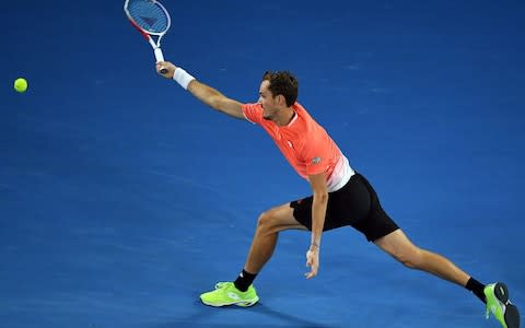 Russia's Daniil Medvedev hits a return against Serbia's Novak Djokovic during their men's singles match on day eight of the Australian Open tennis tournament in Melbourne on January 21, 2019 - Credit: AFP