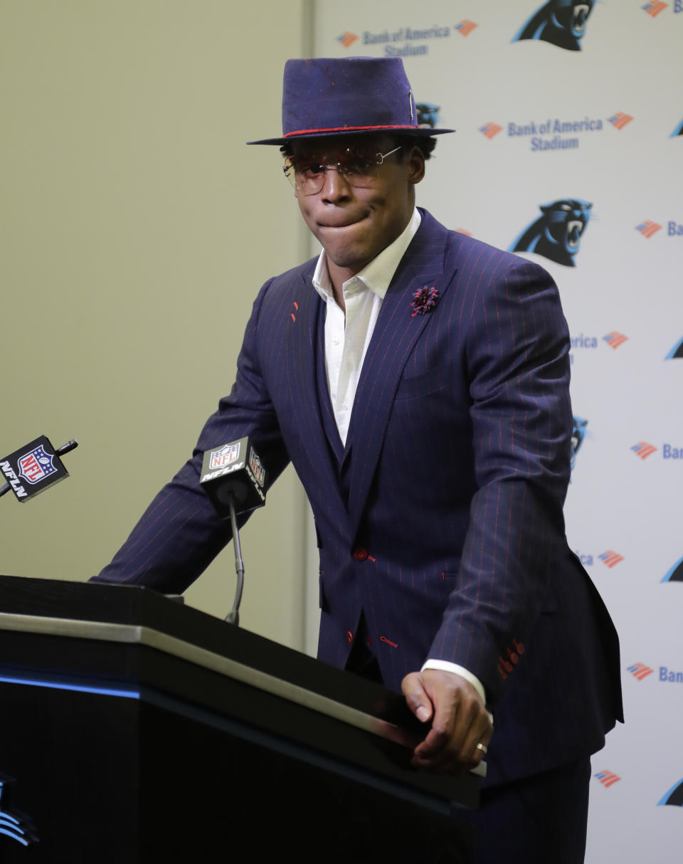 FILE - In this Dec. 18, 2018, file photo, Carolina Panthers' Cam Newton speaks to the media after an NFL football game against the New Orleans Saints, in Charlotte, N.C. Atlanta (5-9) at Carolina (6-8). No Cam Newton here thanks to a bad shoulder that has hampered his throwing; Taylor Heinicke makes his first career start. (AP Photo/Chuck Burton, File)