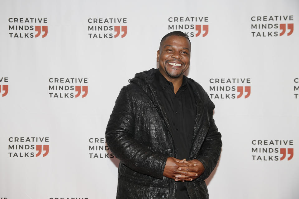 Kehinde Wiley arrives to a Creative Minds Talks during Art Basel, Monday, Dec. 2, 2019, in Miami Beach, Fla. (AP Photo/Brynn Anderson)