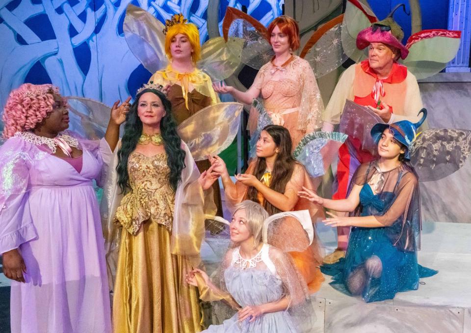 Fairies surround "Queen Titania," played by Sarah Hall, in William Shakespeare's comedy "A Midsummer Night's Dream," on stage at Surfside Playhouse through Sept. 17, 2023. Visit surfsideplayhouse.com.