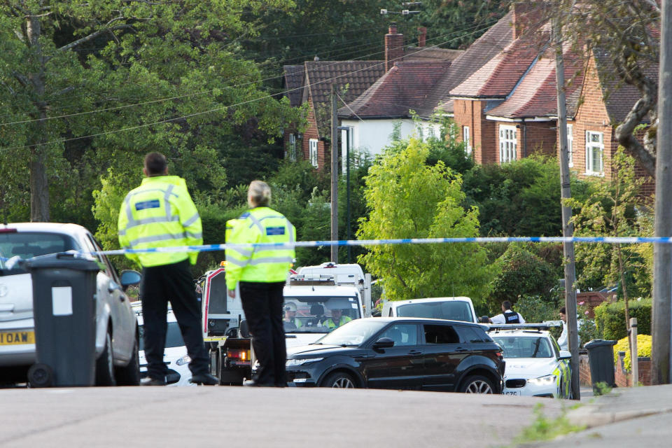 Police examine the Range Rover in Moorcroft Road, Moseley, Birmingham (Picture: SWNS)