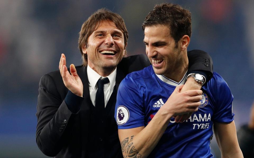 Antonio Conte celebrates after the match with Cesc Fabregas - Mauricio Pochettino is no magician – Chelsea will take years to rebuild - Reuters/John Sibley