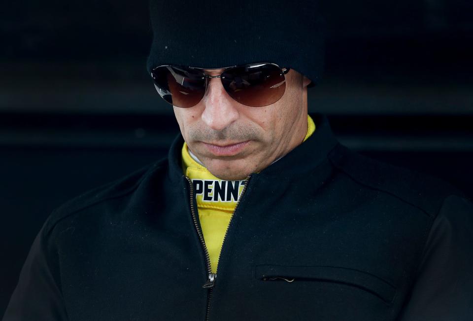 Team Penske Helio Castroneves waits to hit the track during NTT IndyCar Series open testing for the Indianapolis 500 at the Indianapolis Motor Speedway on Wednesday, April 24, 2019.