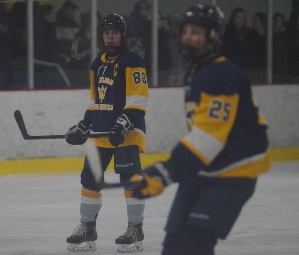 Isaac Hopp (88) looks on during a high school hockey matchup between Gaylord and Grosse Ile on Friday, December 9 during the Division 3 Showcase in Gaylord, Mich..
