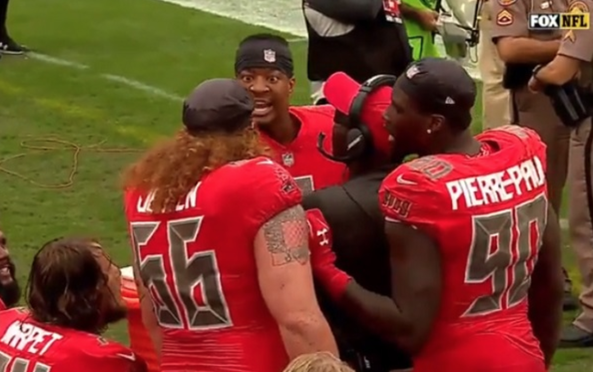 The Tampa Bay Buccaneers enjoy a spirited chat now and then. (via screenshot)