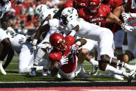 Louisville running back Tiyon Evans (7) fights his way across the goal line to score during the second half of an NCAA college football game against South Florida in Louisville, Ky., Saturday, Sept. 24, 2022. Louisville won 41-3. (AP Photo/Timothy D. Easley)